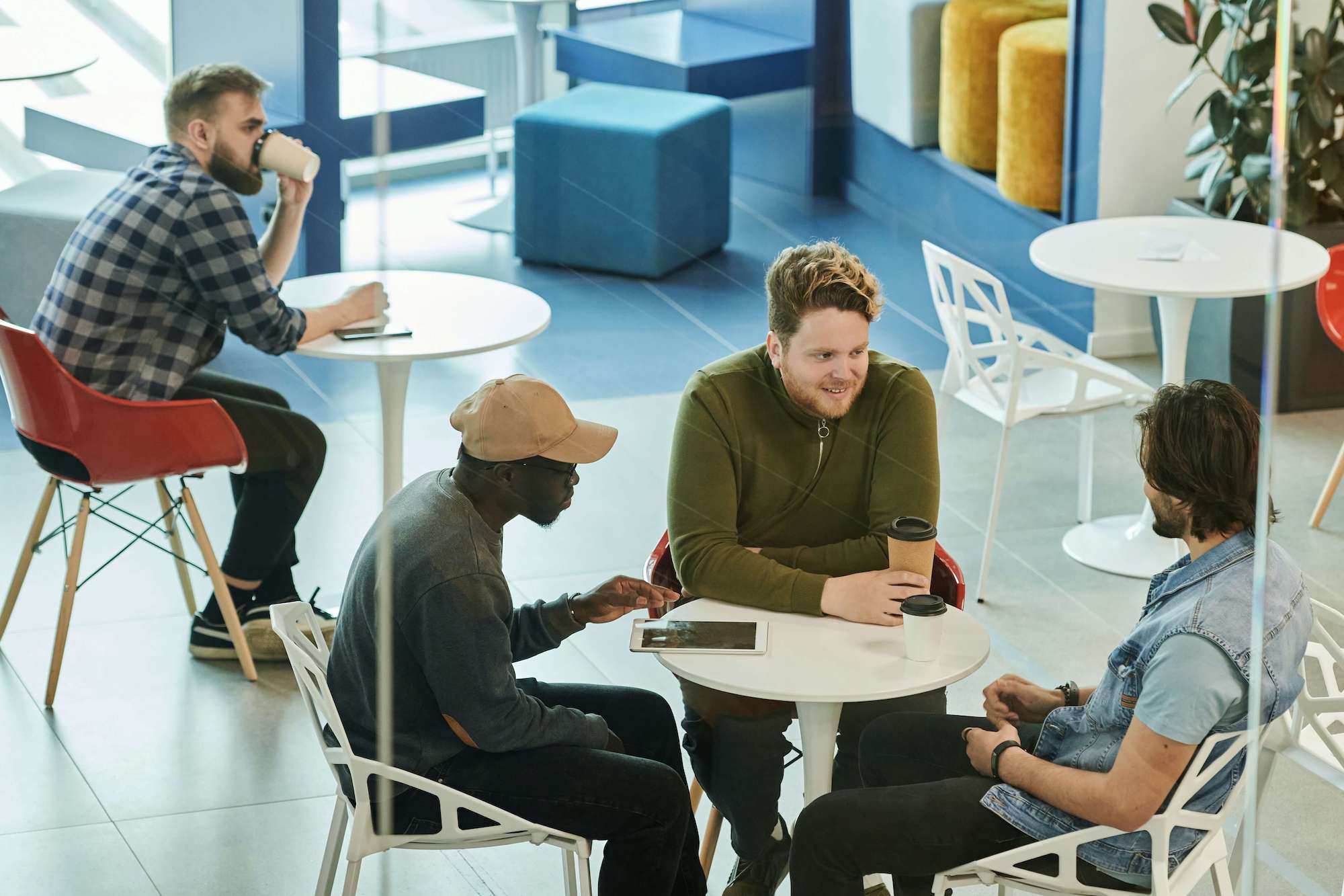 Group of people chatting over coffee